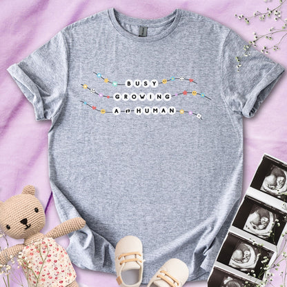 Busy Growing A Human Friendship Bracelet Tee