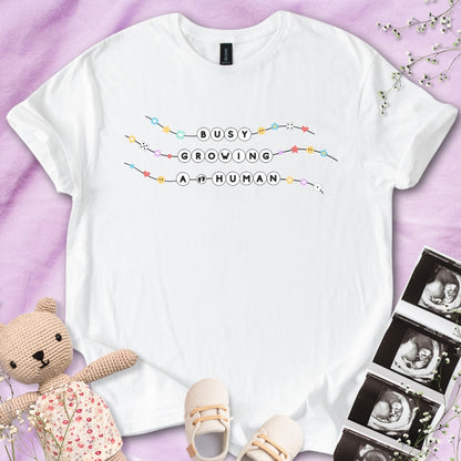 Busy Growing A Human Friendship Bracelet Tee